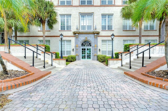 701 Mirror Lake Dr N Unit 309, Saint Petersburg, FL 33701 - view of building exterior featuring stairs