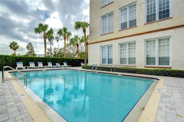 701 Mirror Lake Dr N Unit 309, Saint Petersburg, FL 33701 - pool with fence and a patio area