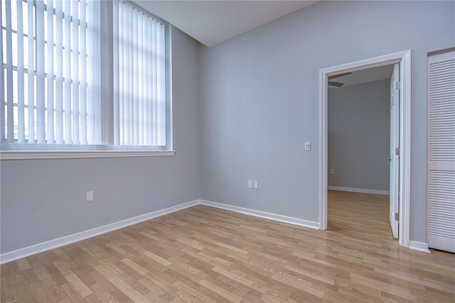 empty room with light wood-type flooring