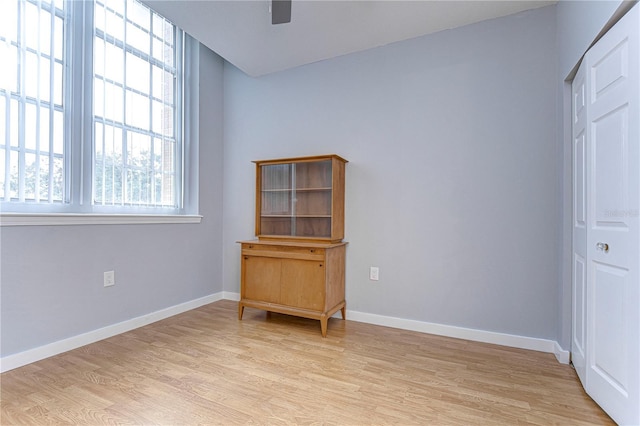 701 Mirror Lake Dr N Unit 309, Saint Petersburg, FL 33701 - interior space with light wood-type flooring, baseboards, and a ceiling fan