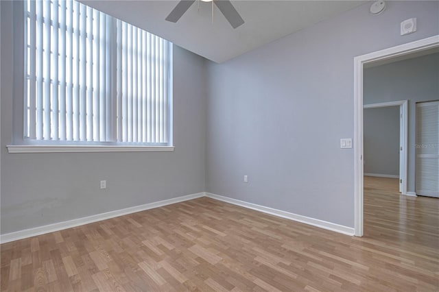 empty room with light hardwood / wood-style floors and ceiling fan