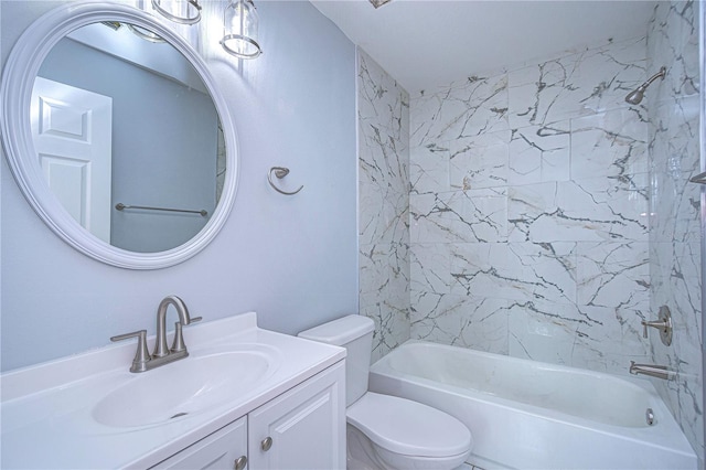 full bathroom with vanity, toilet, and tiled shower / bath