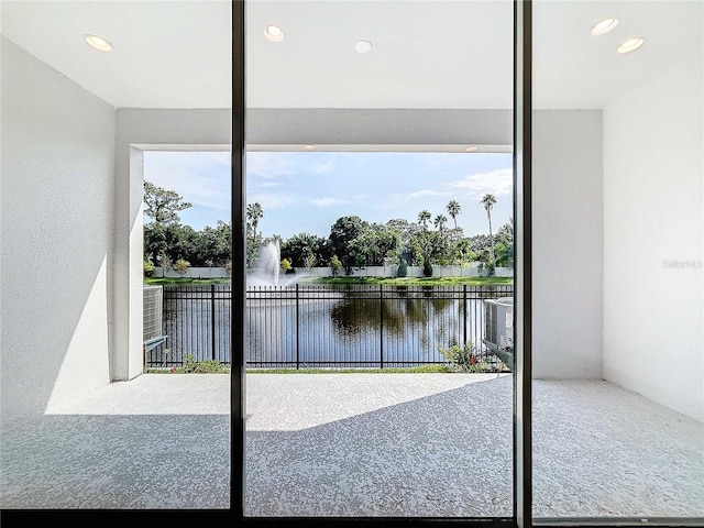 interior space with a water view