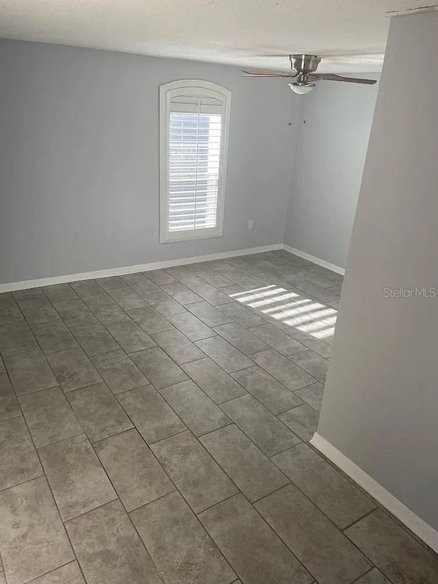 empty room with ceiling fan