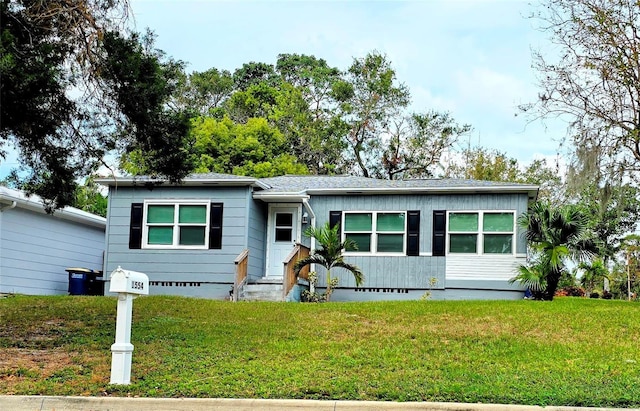 view of front of house with a front lawn