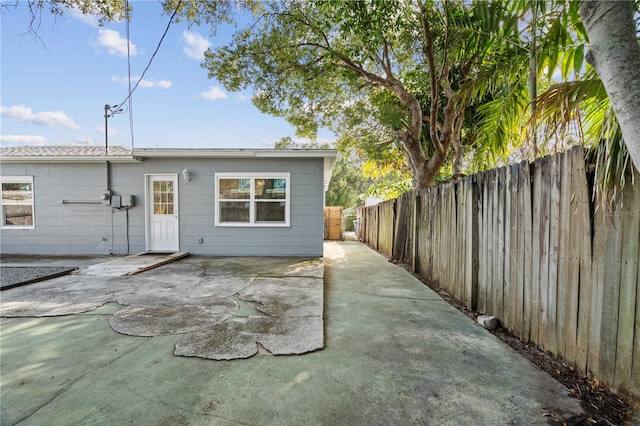 rear view of house featuring a patio