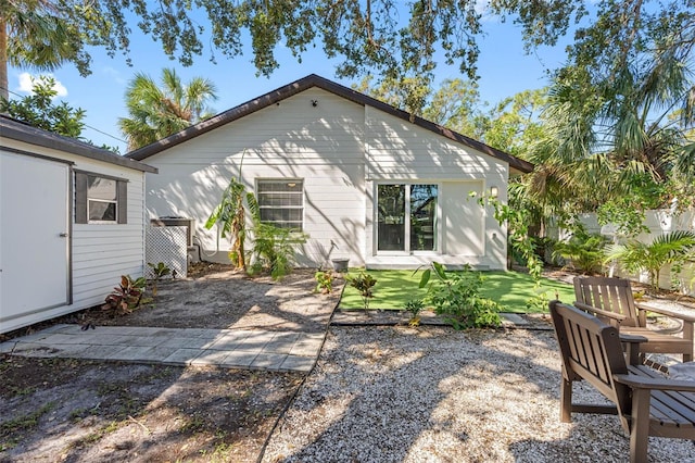 back of property with a patio area