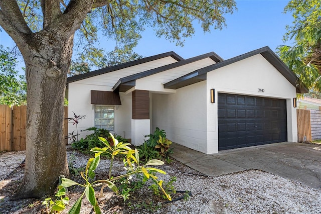 view of front of home with a garage