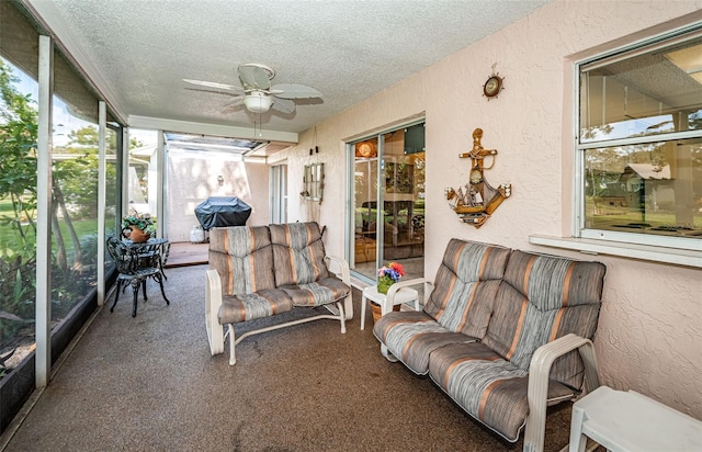 sunroom / solarium with ceiling fan