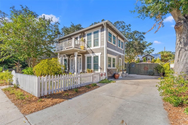 view of front property with a balcony