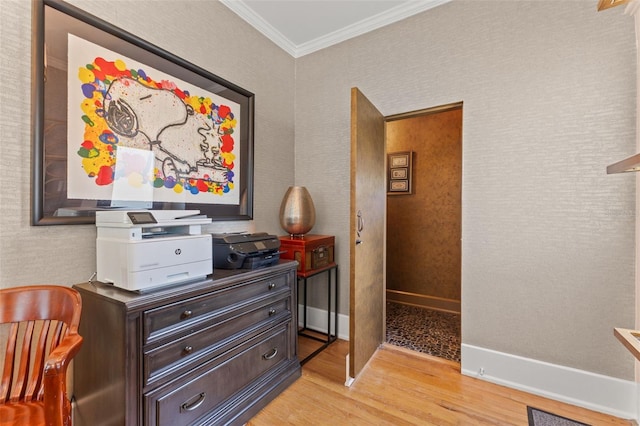 hall featuring ornamental molding and light hardwood / wood-style flooring