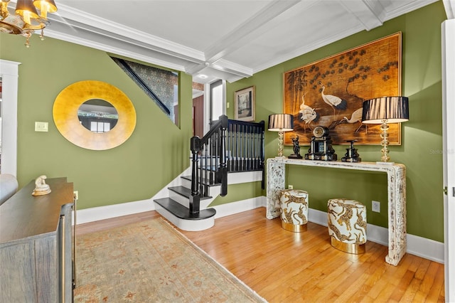 staircase with beam ceiling and wood-type flooring