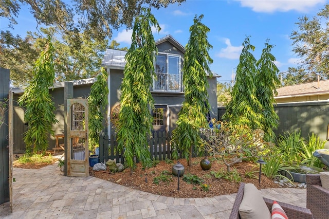 view of front of home with a patio area