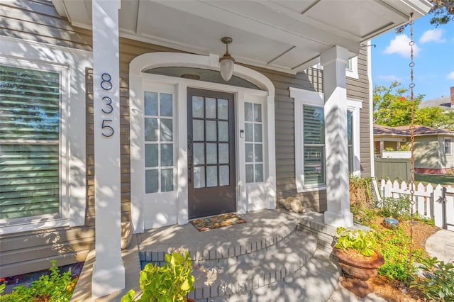 doorway to property with covered porch