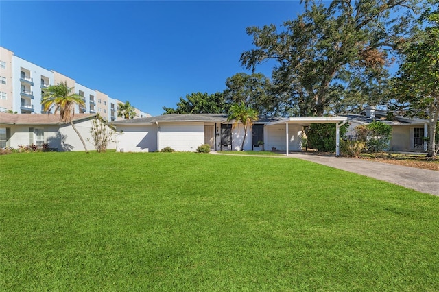 view of front of house with a garage and a front lawn