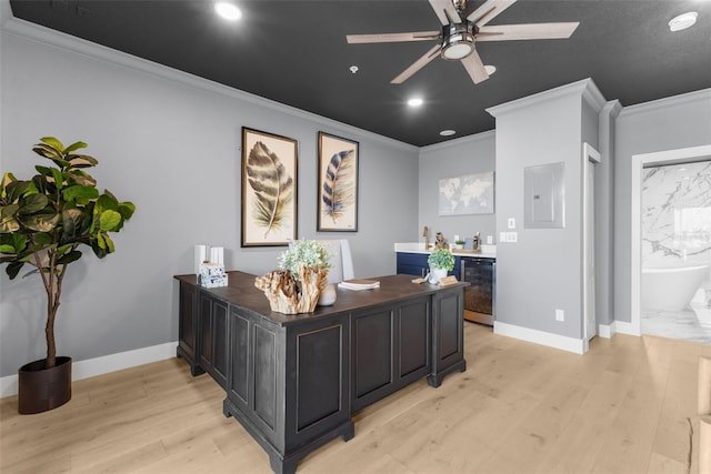 office area with wine cooler, electric panel, ceiling fan, light hardwood / wood-style floors, and crown molding