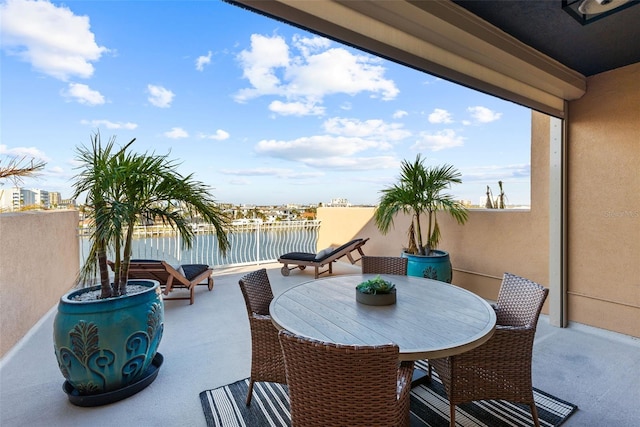 view of patio / terrace with a water view