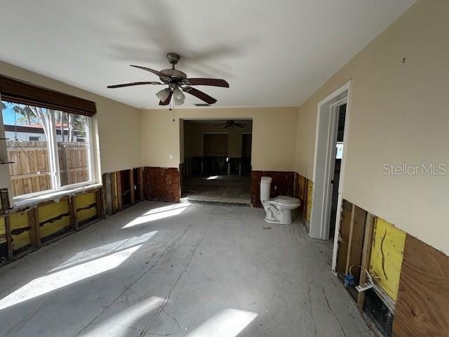 interior space featuring ceiling fan