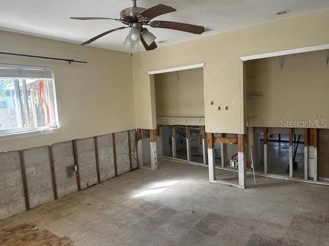 empty room featuring ceiling fan