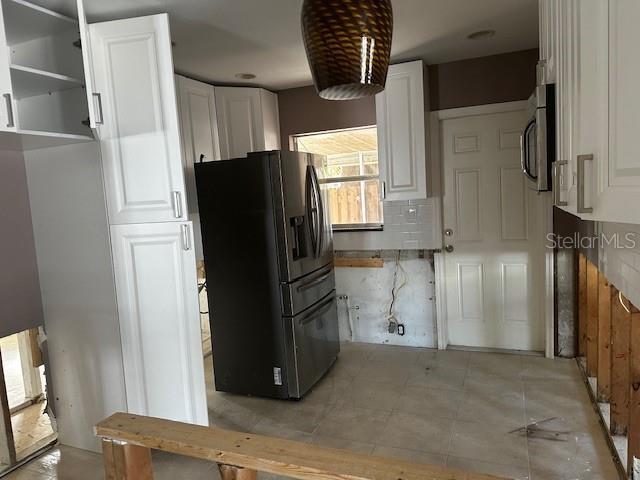 kitchen with white cabinets and stainless steel appliances