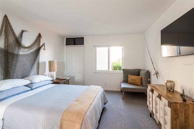 carpeted bedroom with a closet