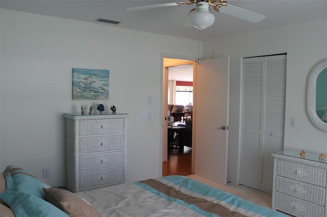 bedroom with a closet and ceiling fan