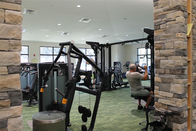 exercise room featuring carpet flooring