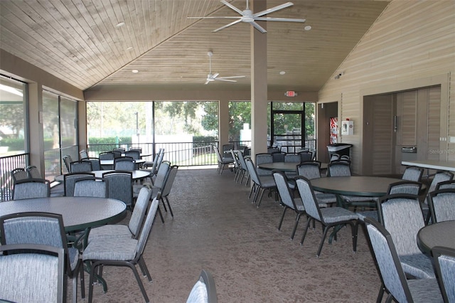 exterior space with high vaulted ceiling, wooden ceiling, and plenty of natural light