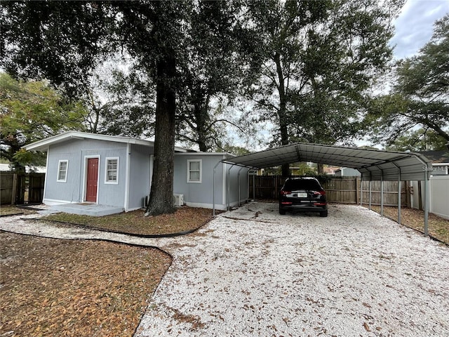 view of front of property with a carport