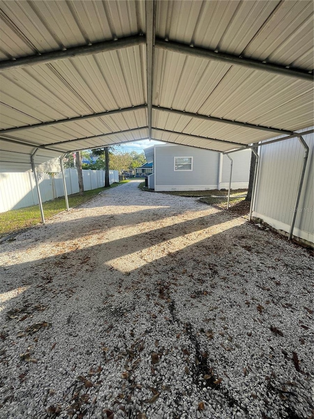 garage featuring a carport