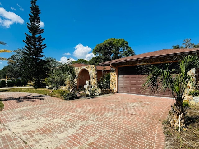 view of front of property with a garage