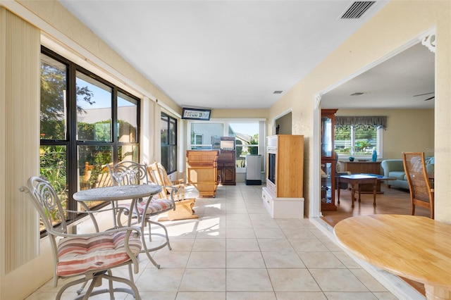 sunroom featuring a healthy amount of sunlight