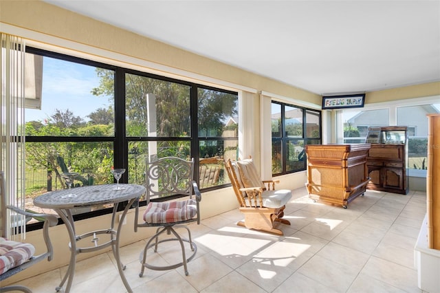 sunroom / solarium with a wealth of natural light