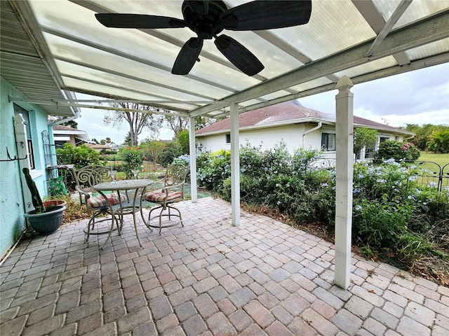 view of patio featuring ceiling fan