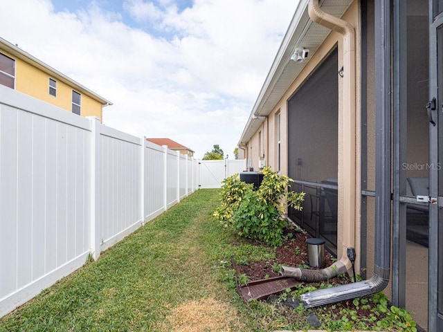 view of yard featuring central AC