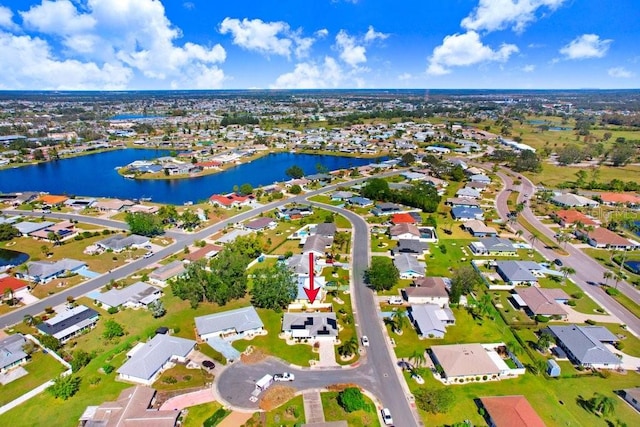 drone / aerial view featuring a water view