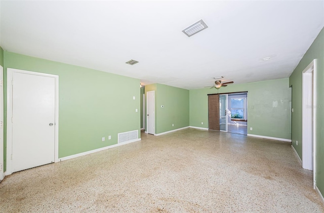 empty room featuring ceiling fan