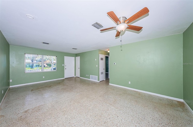 spare room with ceiling fan