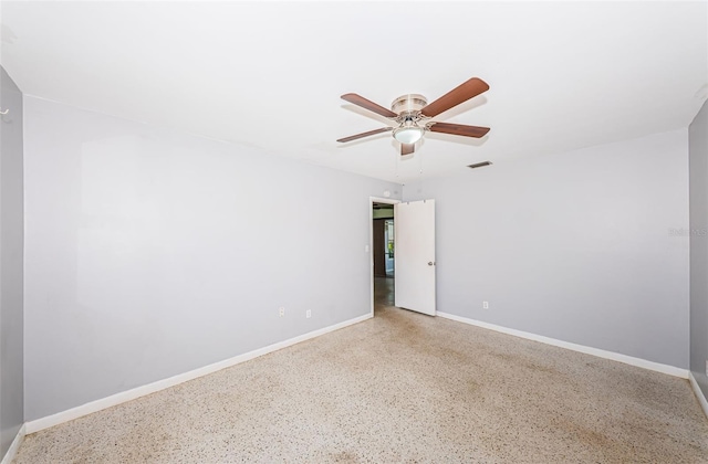 spare room featuring ceiling fan