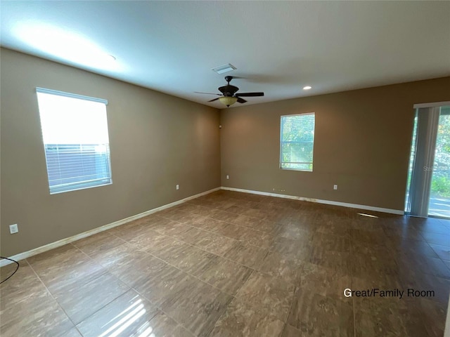 spare room featuring ceiling fan