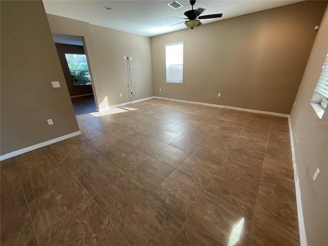 spare room featuring ceiling fan