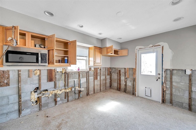 kitchen with a wealth of natural light and light brown cabinets