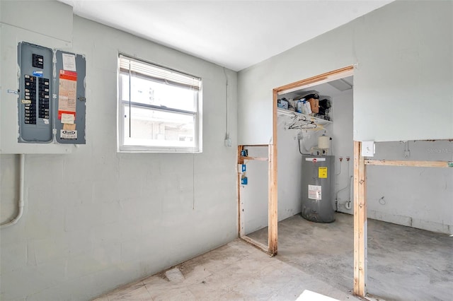 utility room featuring electric water heater