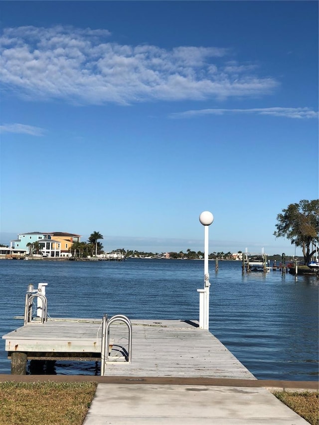 dock area featuring a water view