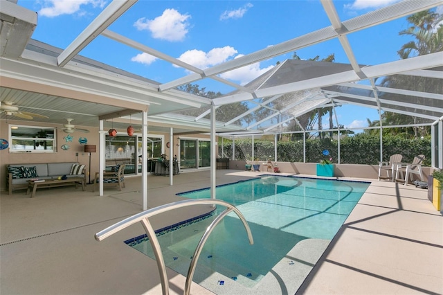 view of pool featuring outdoor lounge area, a lanai, and a patio