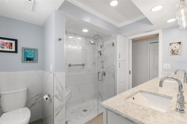 bathroom featuring walk in shower, ornamental molding, vanity, tile walls, and toilet