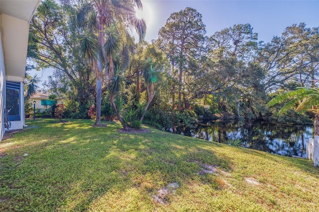 view of yard featuring a water view