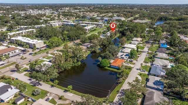 bird's eye view with a water view