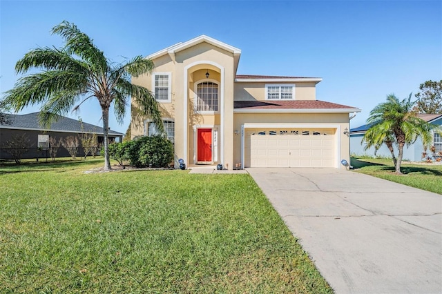 mediterranean / spanish house featuring a front lawn and a garage