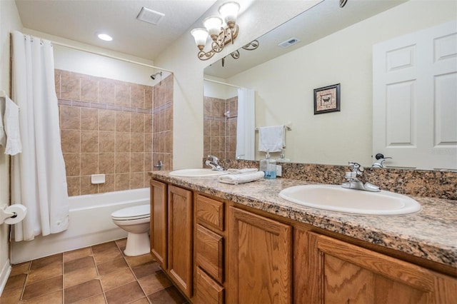 full bathroom with vanity, shower / bath combination with curtain, toilet, and tile patterned flooring